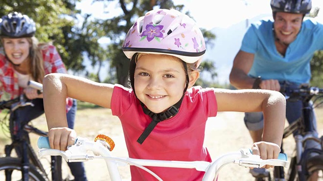 young girl on bike
